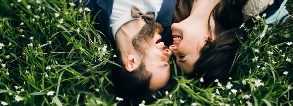 Happy couple smile to show wedding smile makeover teeth