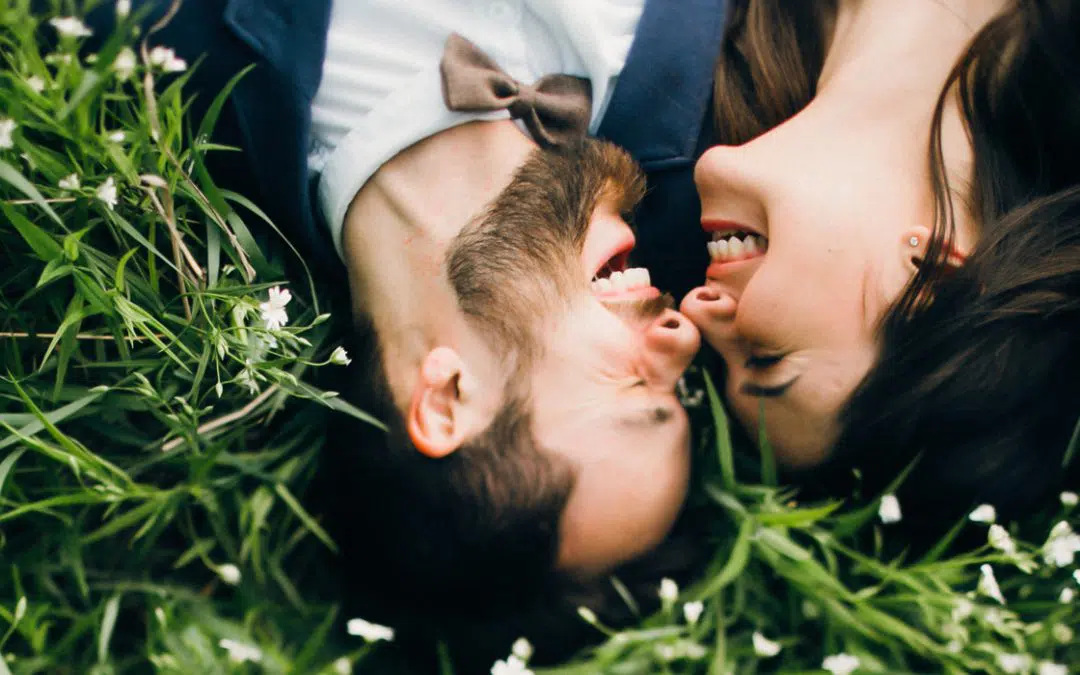 Happy couple smile to show wedding smile makeover teeth